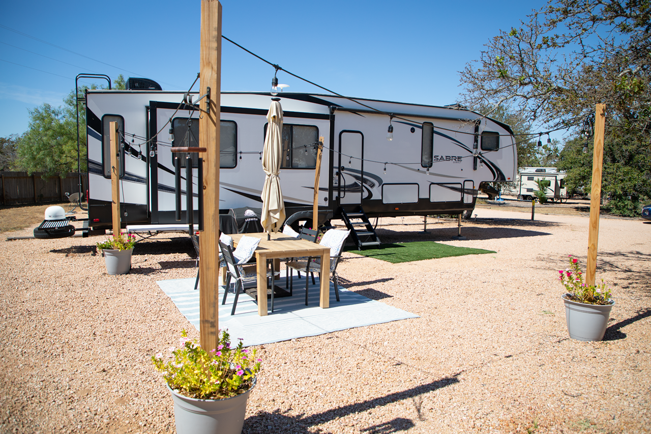 Trailer parked at Seven Lakes RV Resort
