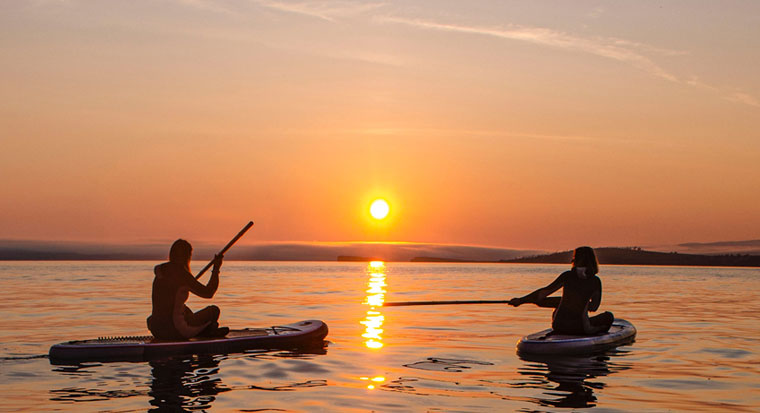 Sunset over Lake Buchanan, Texas with a boat on the water